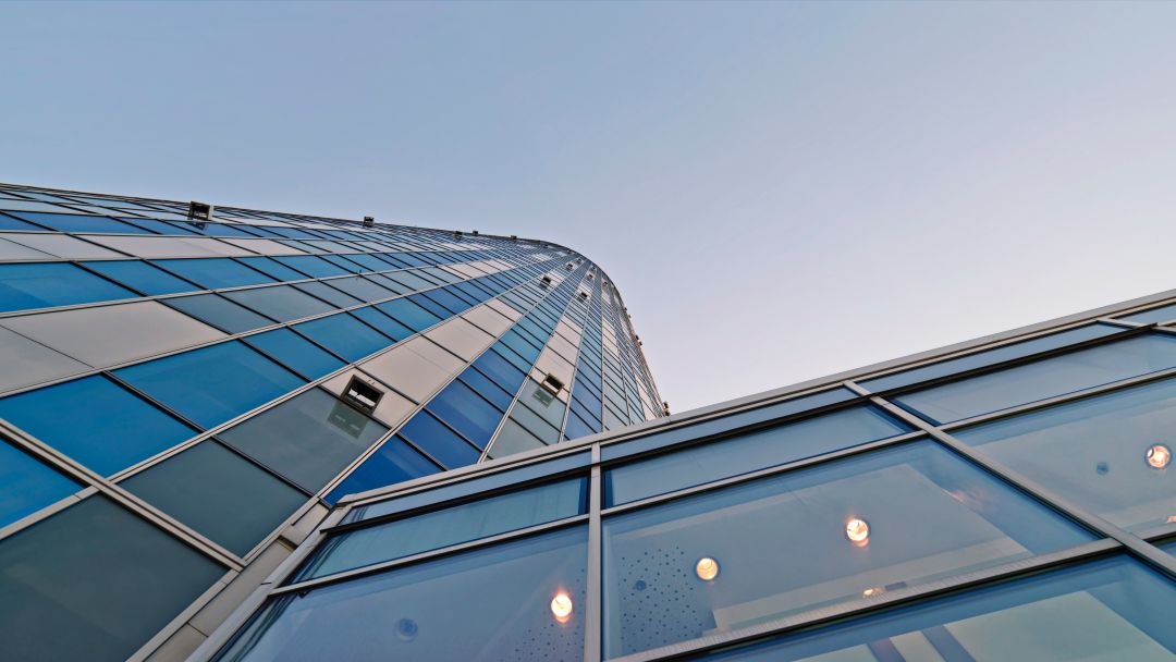 low angle of a building with a commercial roof