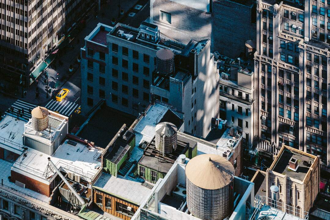 an aerial view of commercial rooftops