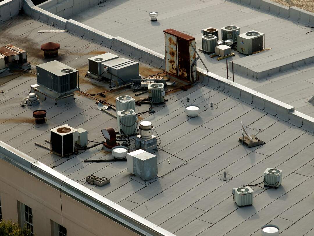 A commercial roof in need of repairs