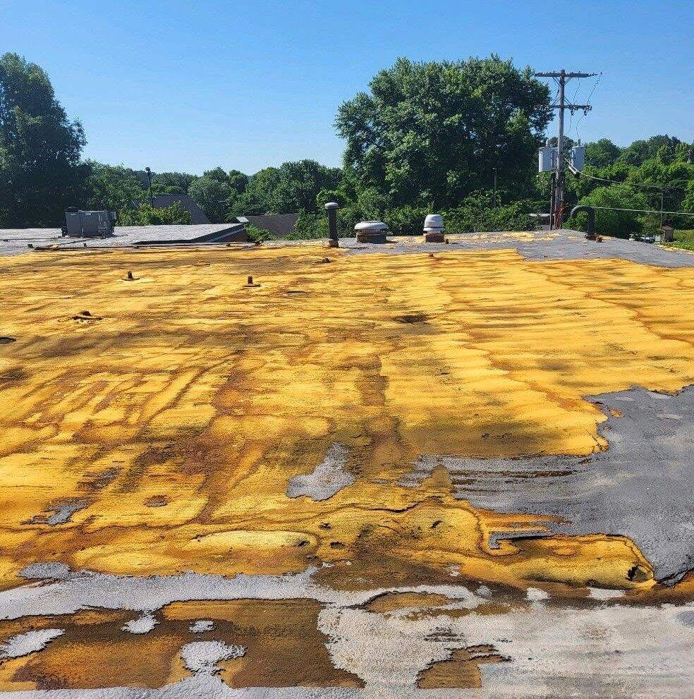 a roof with severely degraded polyurethane foam SPF roofing