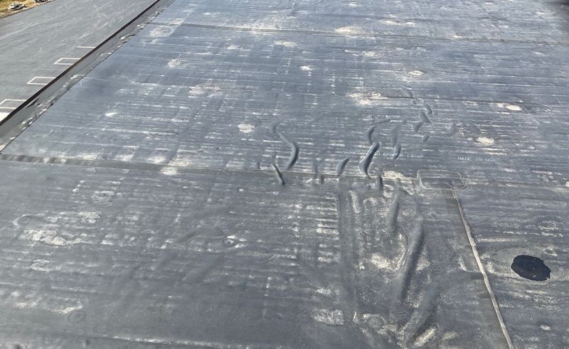 a faulty EPDM roofing installation job