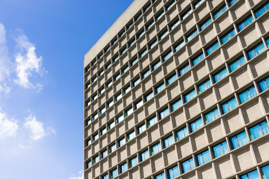 low angle of a commercial building in need of repair