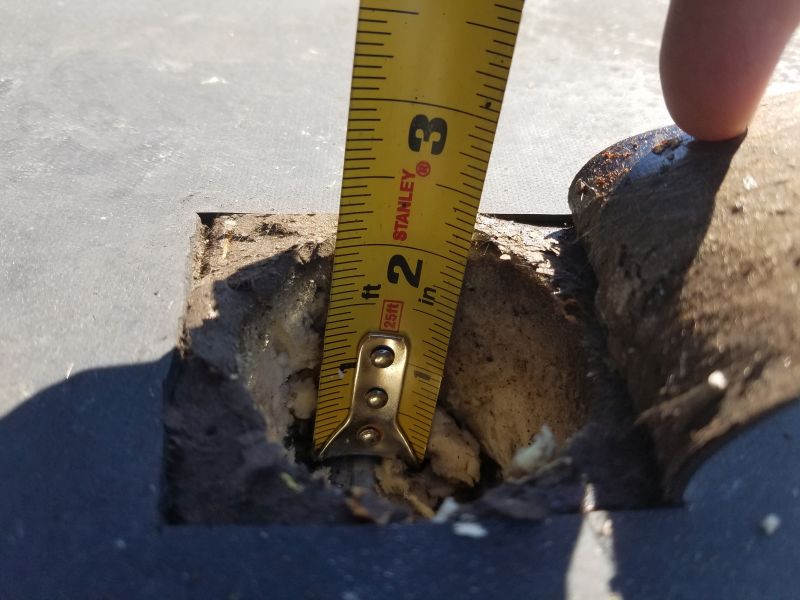 a core cut taken from a commercial roof