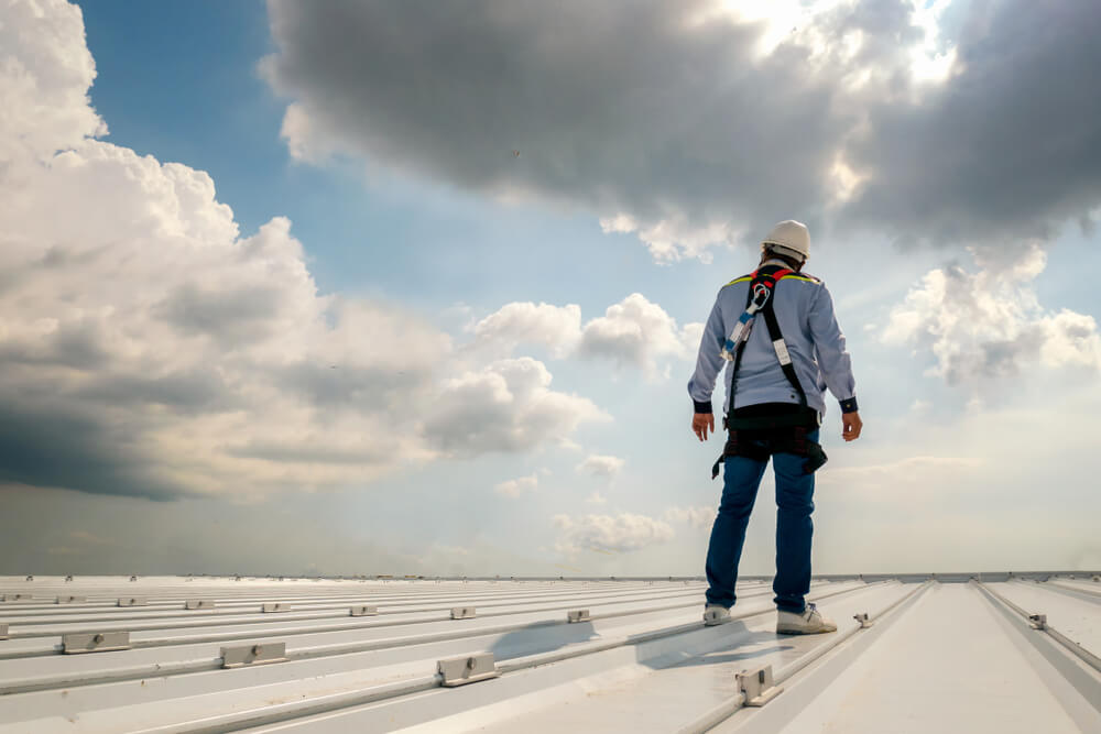 Roofer during Commercial Roof Maintenance