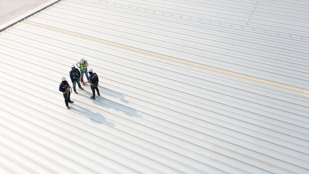 roofers performing a Commercial Roof Maintenance