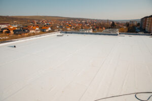 Flat roof with PVC membrane.