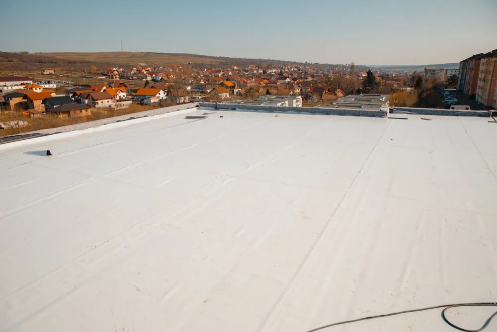 Flat roof with PVC membrane.