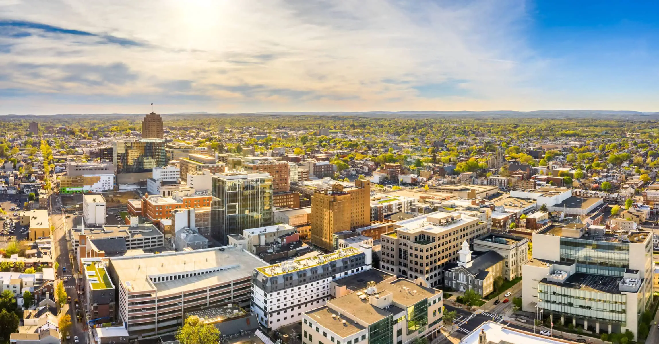 a city with many buildings and trees