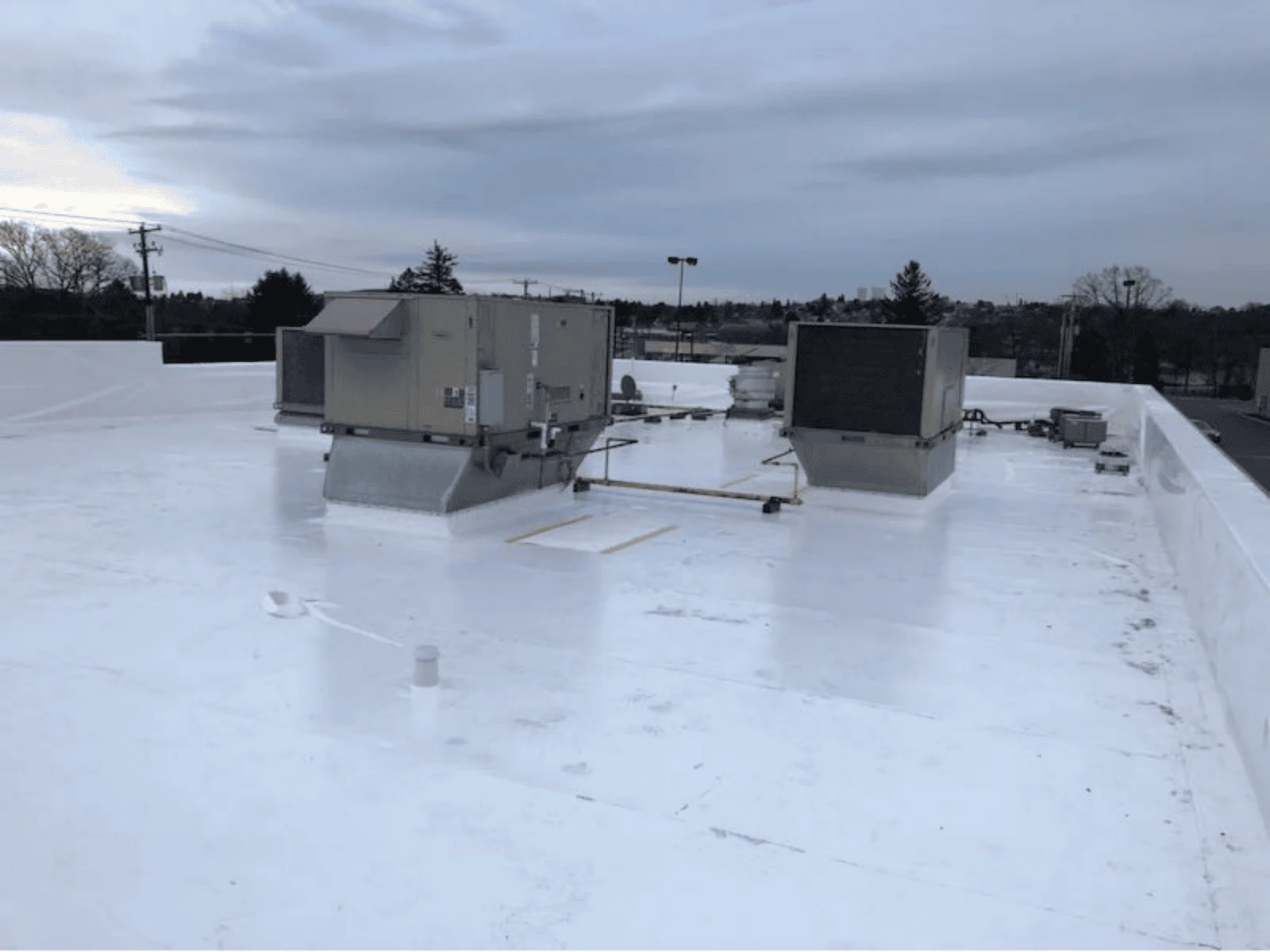 a roof with air conditioning units