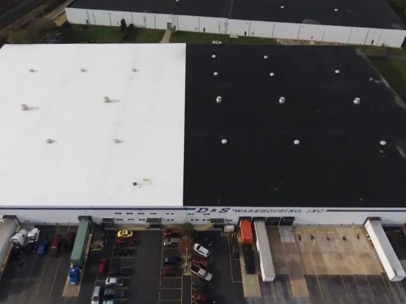 a building with a black roof