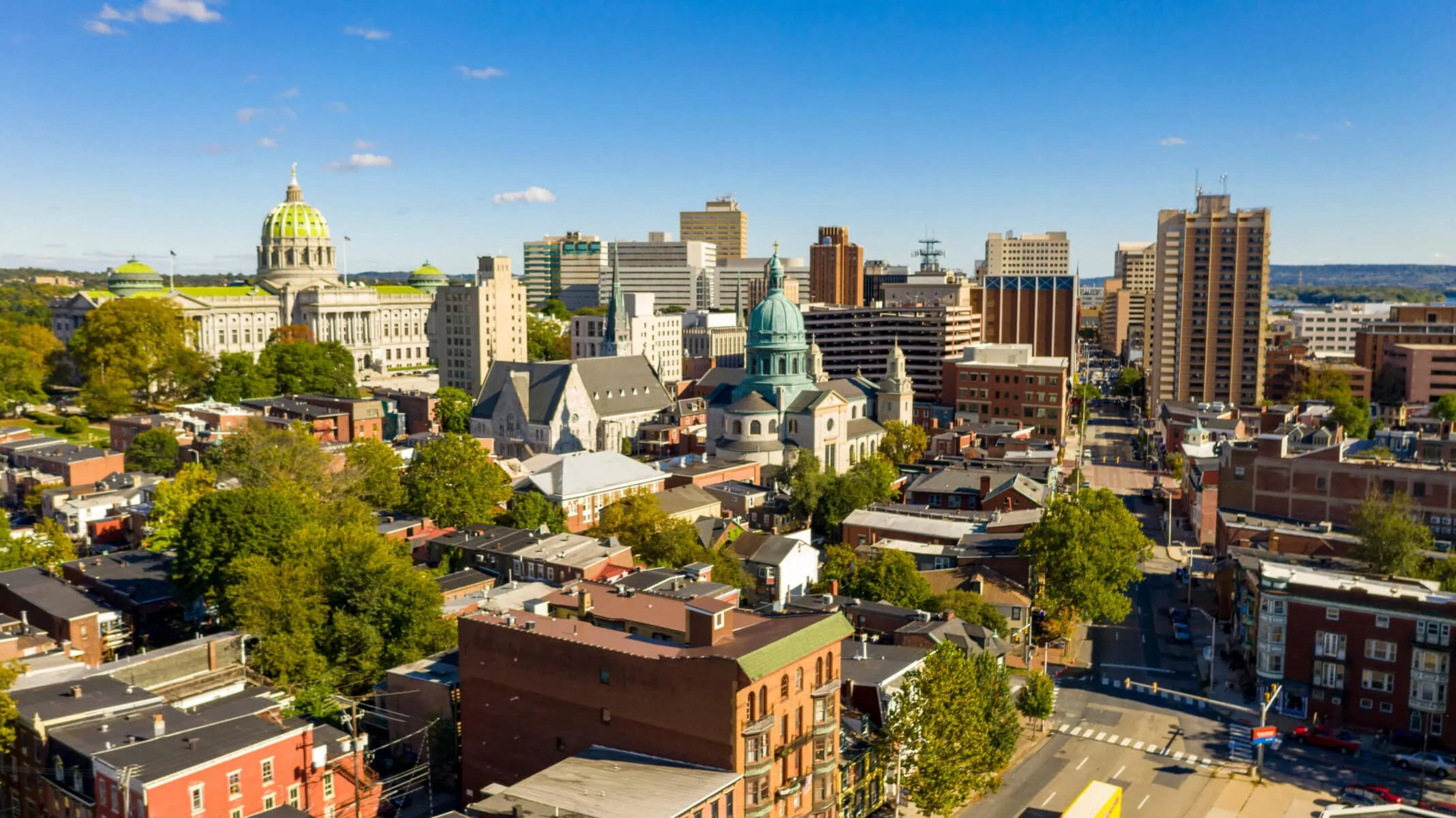 a city with many buildings and trees