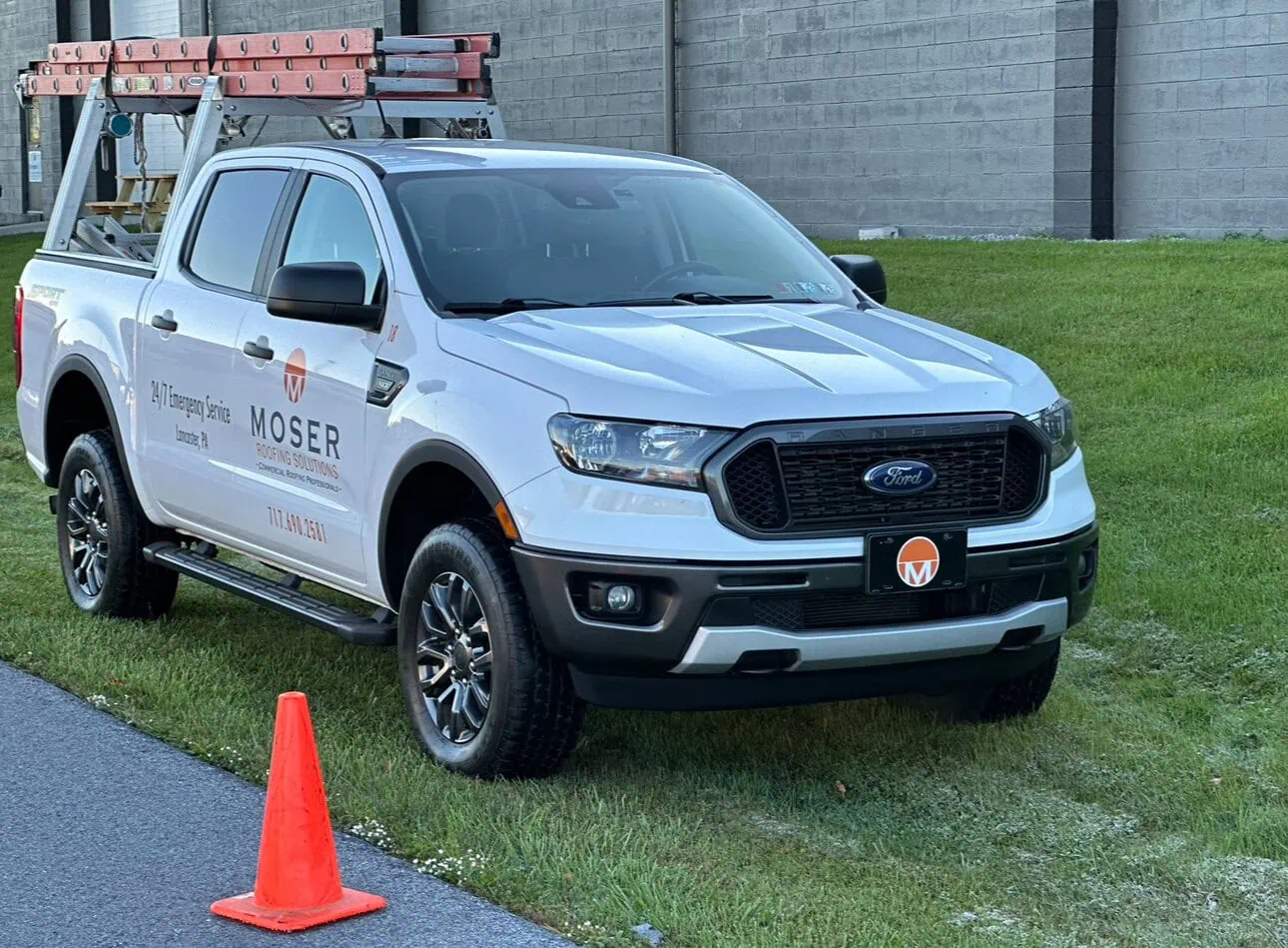a truck parked on the grass