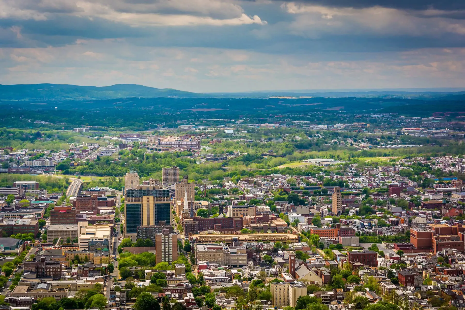 a city with many buildings and trees