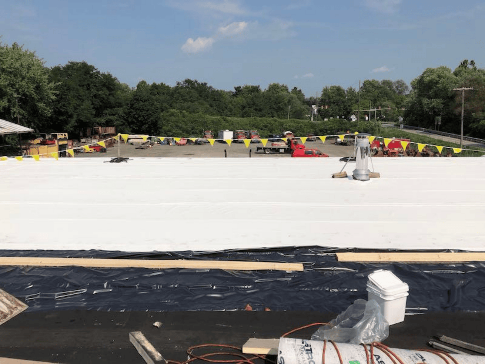 a roof of a building with a white tarp