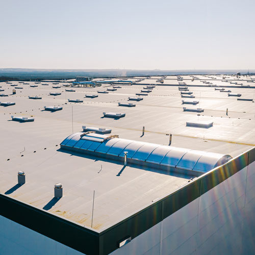 a large building with many roofs