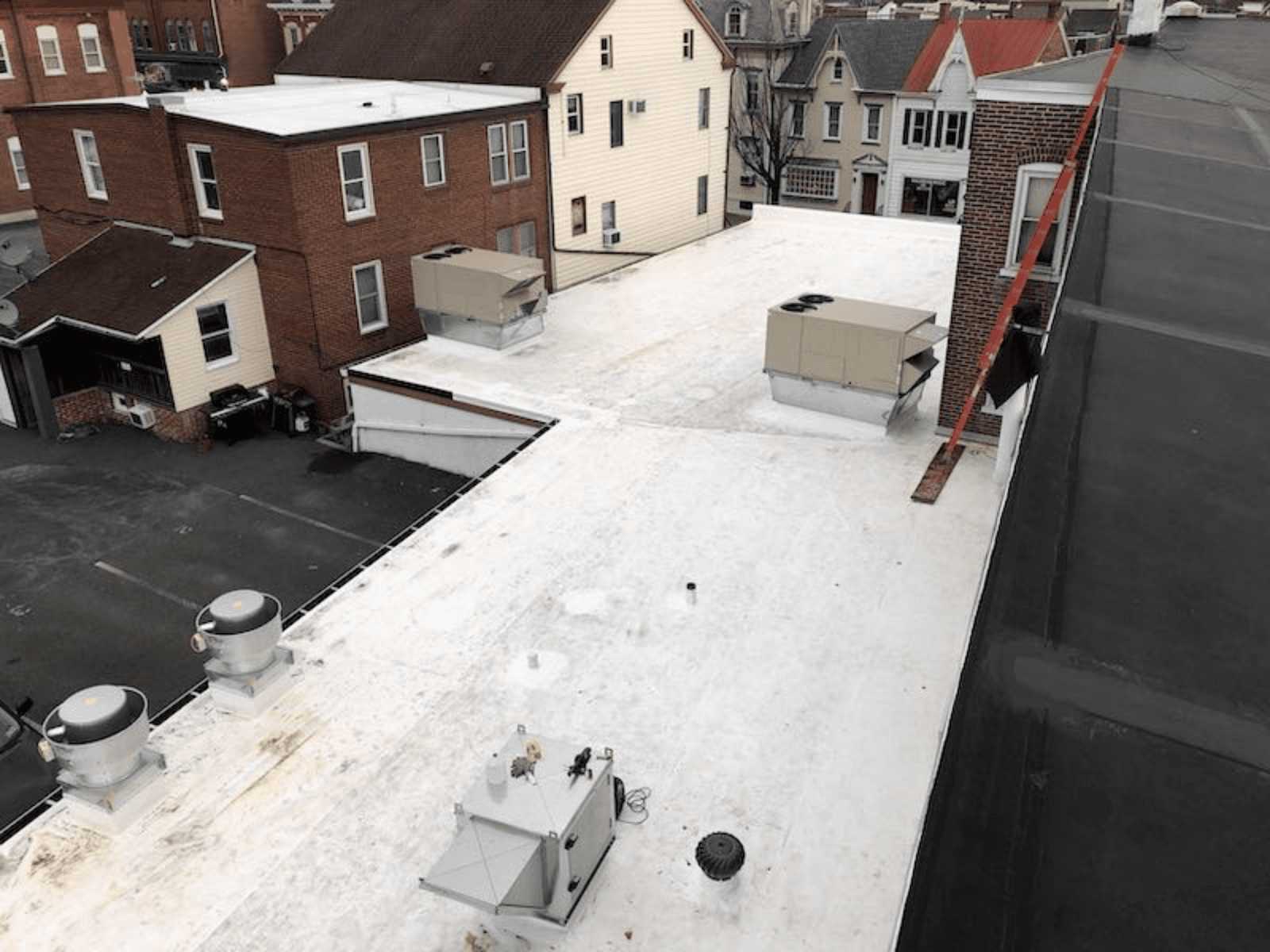 a rooftop of a building with a roof top