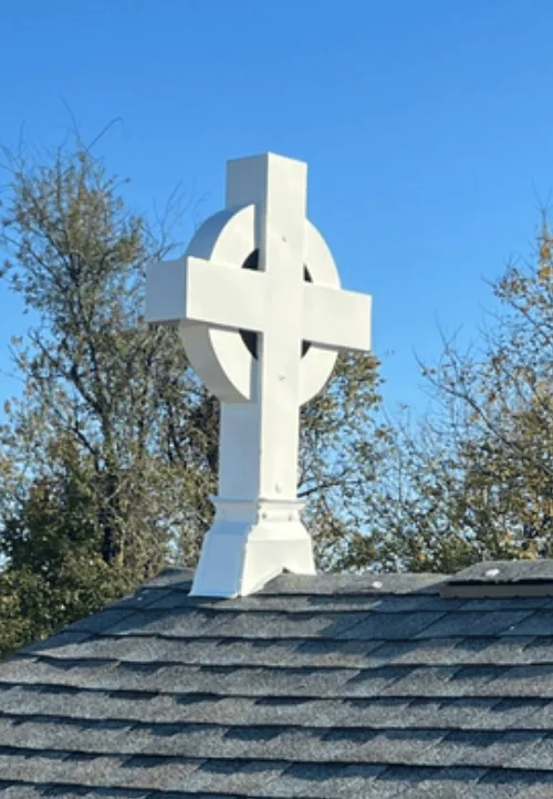A clean cross on a church